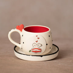 Teetasse | Kaffeetasse | „Liebe ist..." mit Herz | Mit einem „Pärchen auf einem Boot " verziert | Handgemacht aus Keramik getöpfert | Designer Tasse